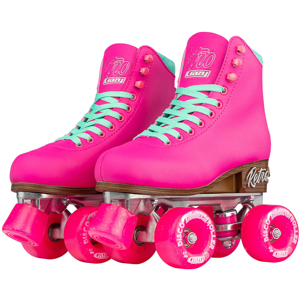 Pink roller skates with clear wheels on a white background