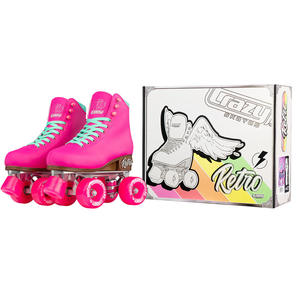 Pink roller skates with green laces next to their packaging box on a white background